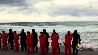 UNCENSORED RAW FOOTAGE ISIS video beheading of 21 Egyptian Coptic Christians [upl. by Vasya]